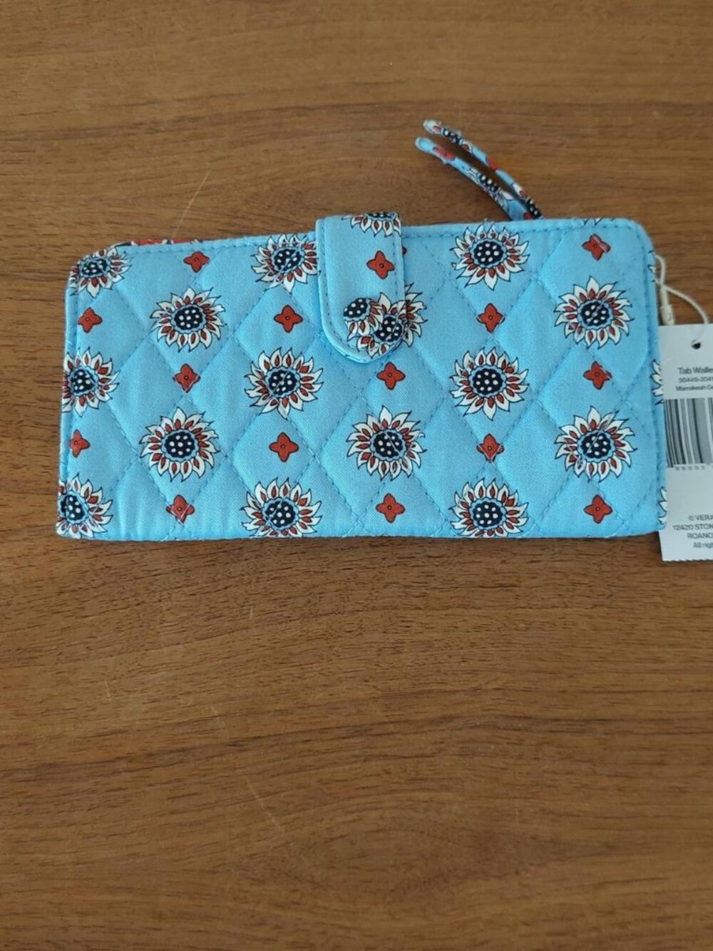 Vera Bradley blue quilted wallet with white & red sunflower and diamond pattern